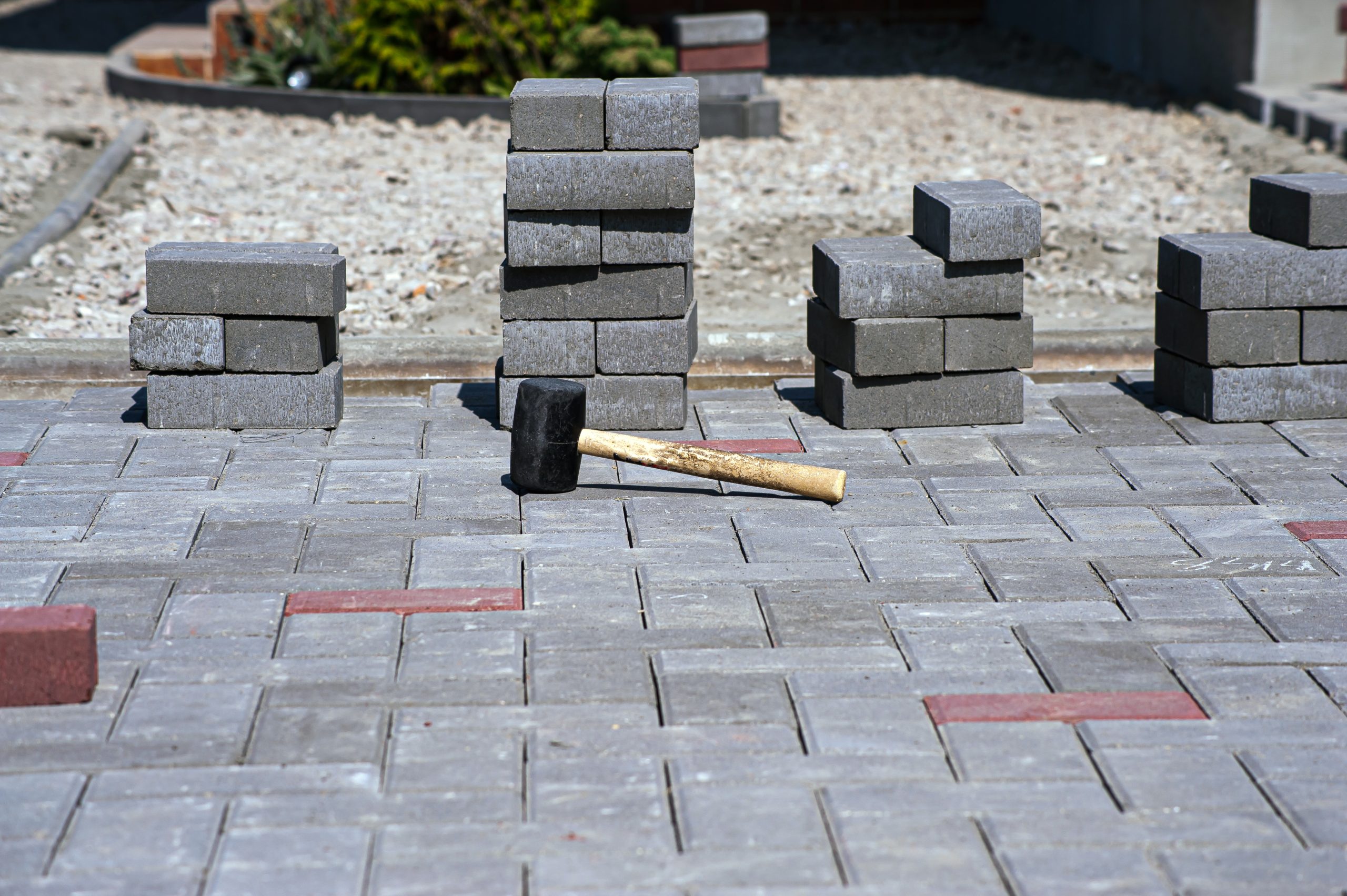 Paving slabs of different colors and shapes.Texture of different colored patterned paving slabs .